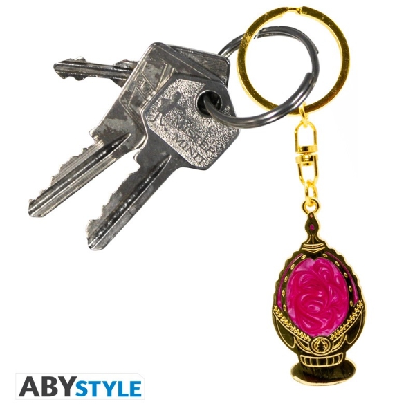 Madoka, die Quelle ihrer Macht und der Behälter ihrer Seele, muss ihr Seelenjuwel um jeden Preis schützen! Mit einer Goldplattierung mit einem blutigen rosa Emaille kreiert dieser Metall-Schlüsselanhänger von ABYstyle perfekt Madoka Kanames Soul-Edelstein